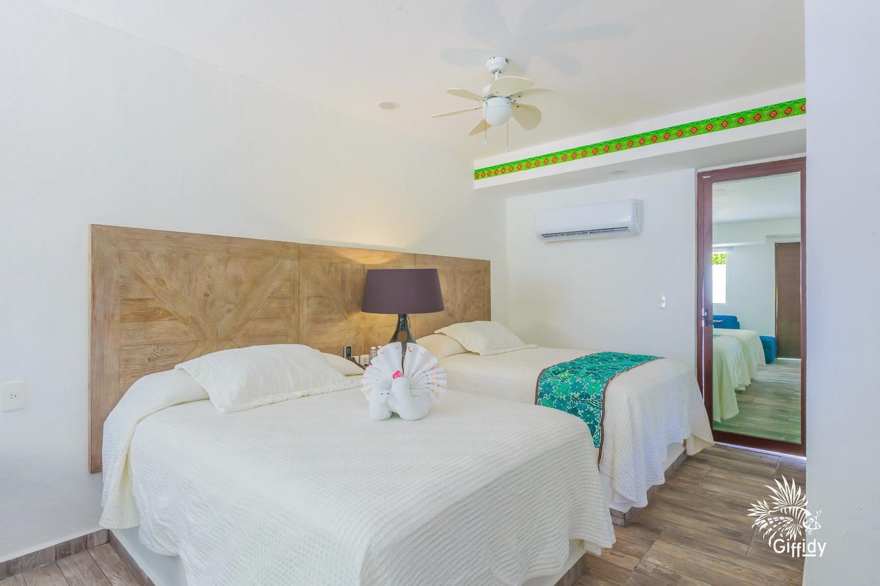 Hotel Paradise Suites إيسلا موخيريس المظهر الخارجي الصورة